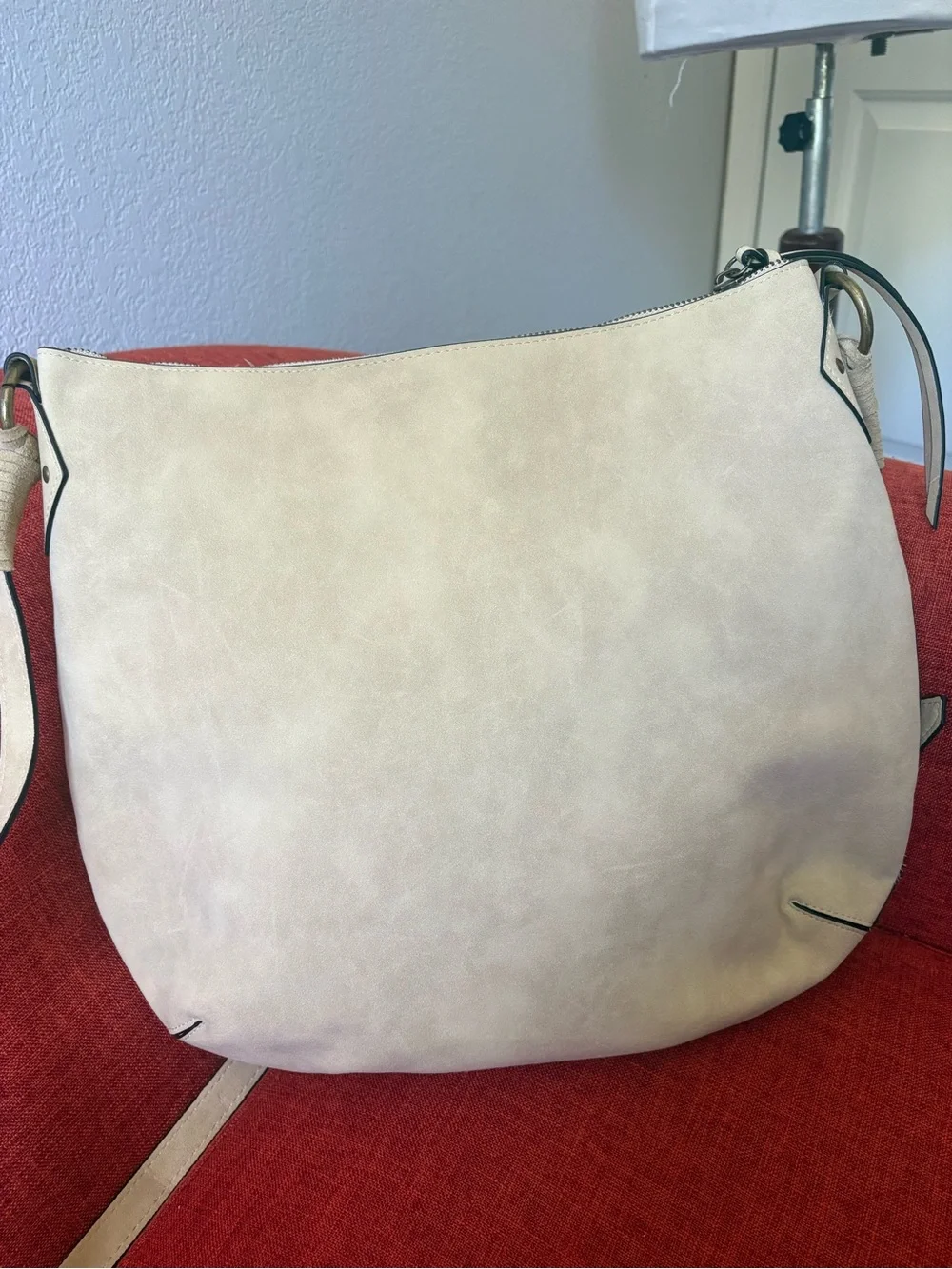 Elle Jae Gypset boho crossbody bag in a cream faux suede bag